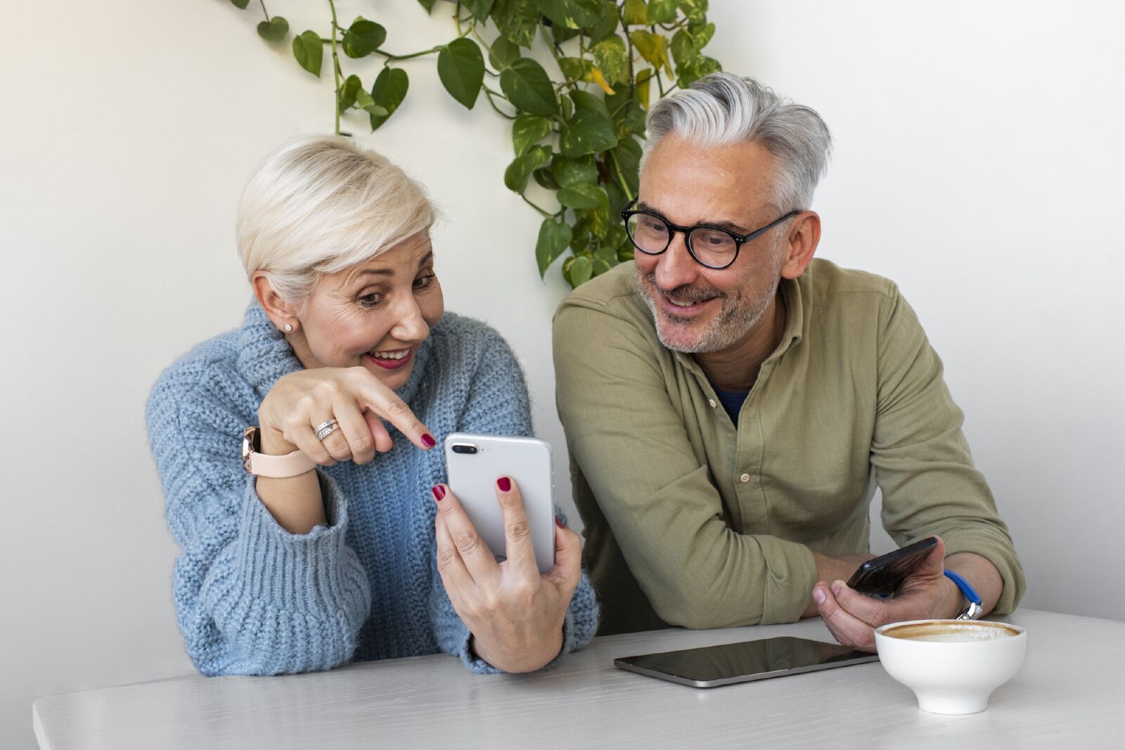 Mature couple over 50 smiling together outdoors - dating success after retirement